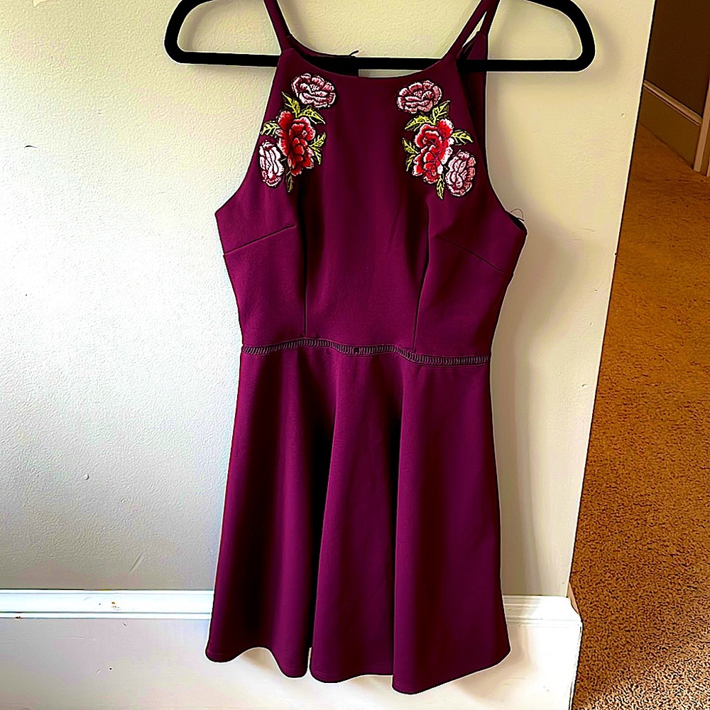 GEORGEOUS maroon dress! Size 5 and is VERY soft on the inside! Also, very loose!